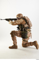  Photos Robert Watson Army Czech Paratrooper Poses aiming gun kneeling whole body 0001.jpg
